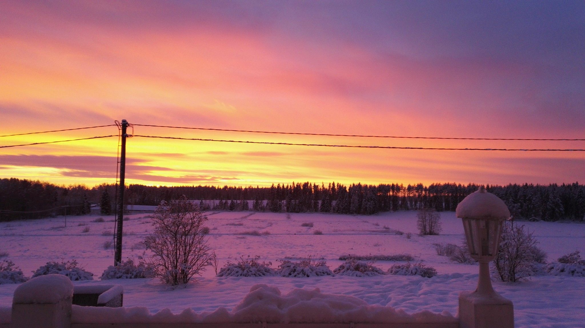 Auringonlasku Evijärvellä. – Jaana Haapasalo