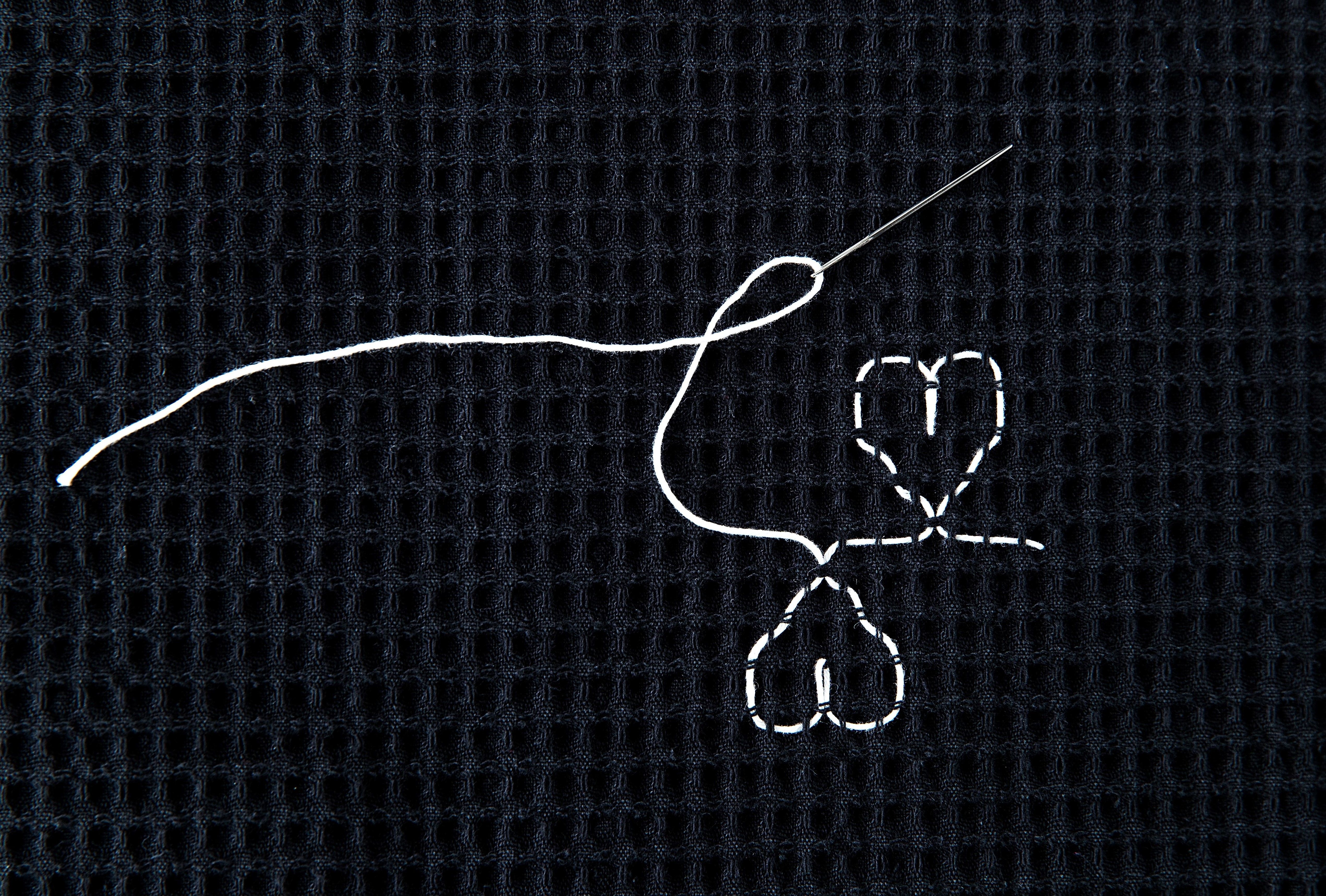 Nauhamainen kuvio muodostuu kahdesta sydämestä, joista toinen on ylösalaisin.