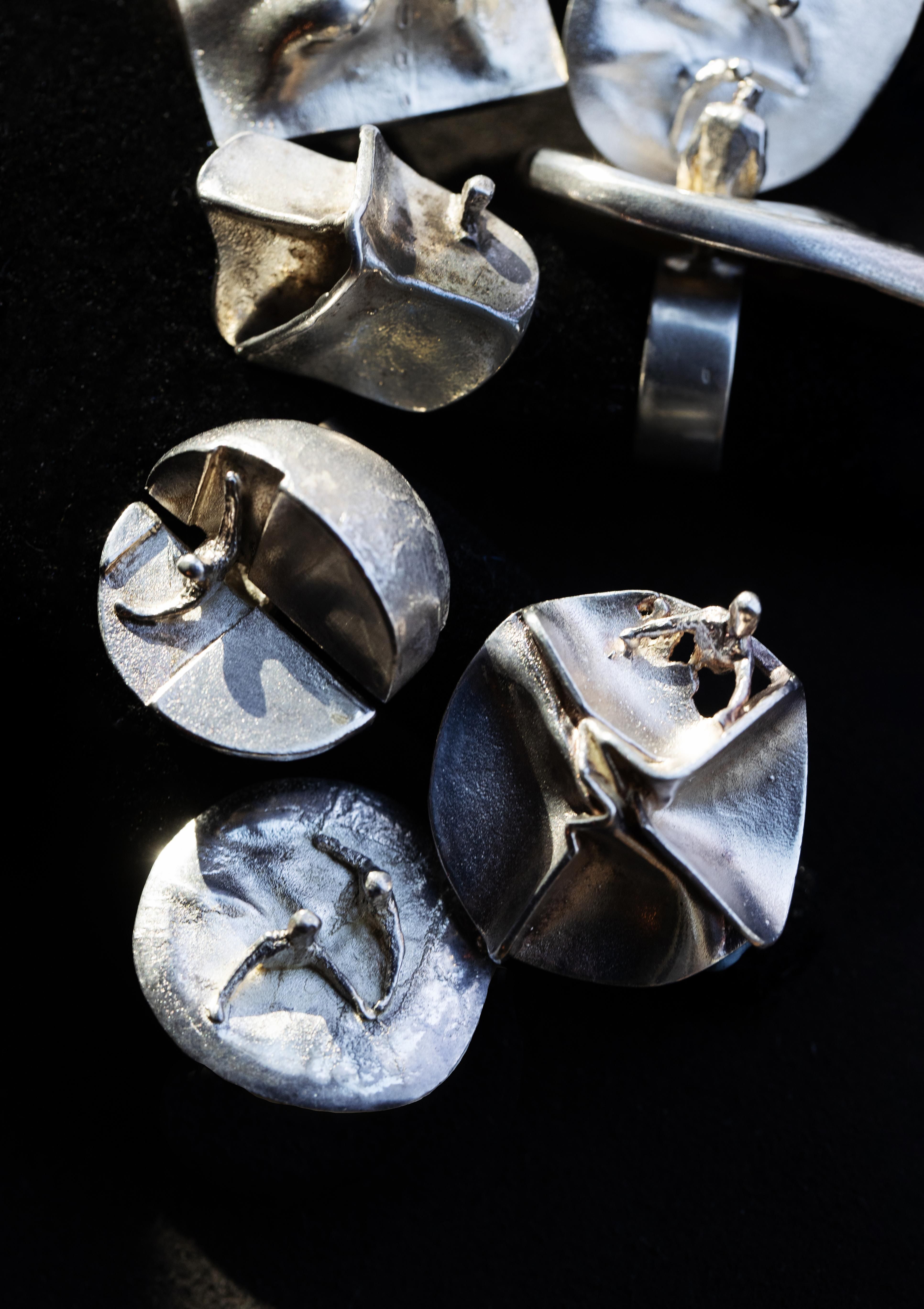 Björn Weckströmin sterlinghopeisia sormuksia vuodelta 1969: Magman sisällä, Brukkan lampi, Ikaros, Jaaran uni ja Galaktinen tanssi.